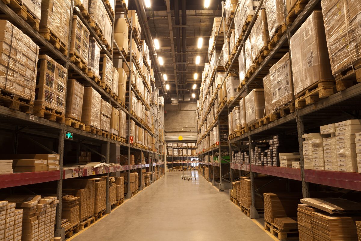 Warehouse aisle lined with boxed inventory